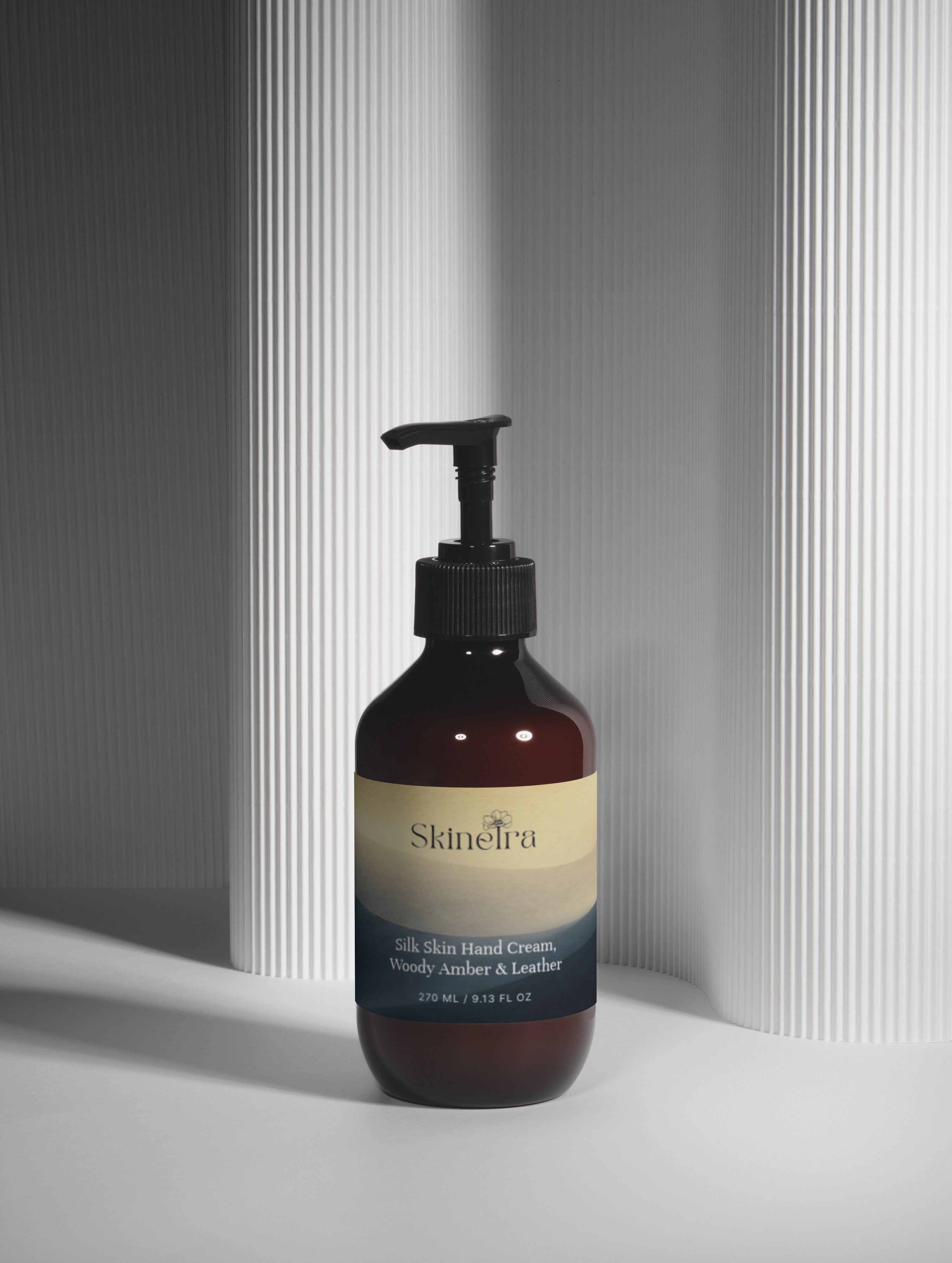 Silk Skin Hand Cream, Woody Amber & Leather